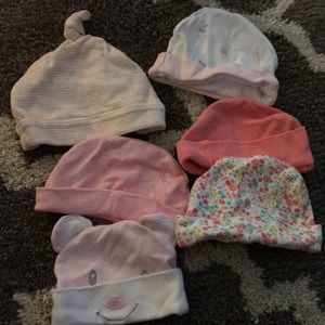 Bundle of baby hats.